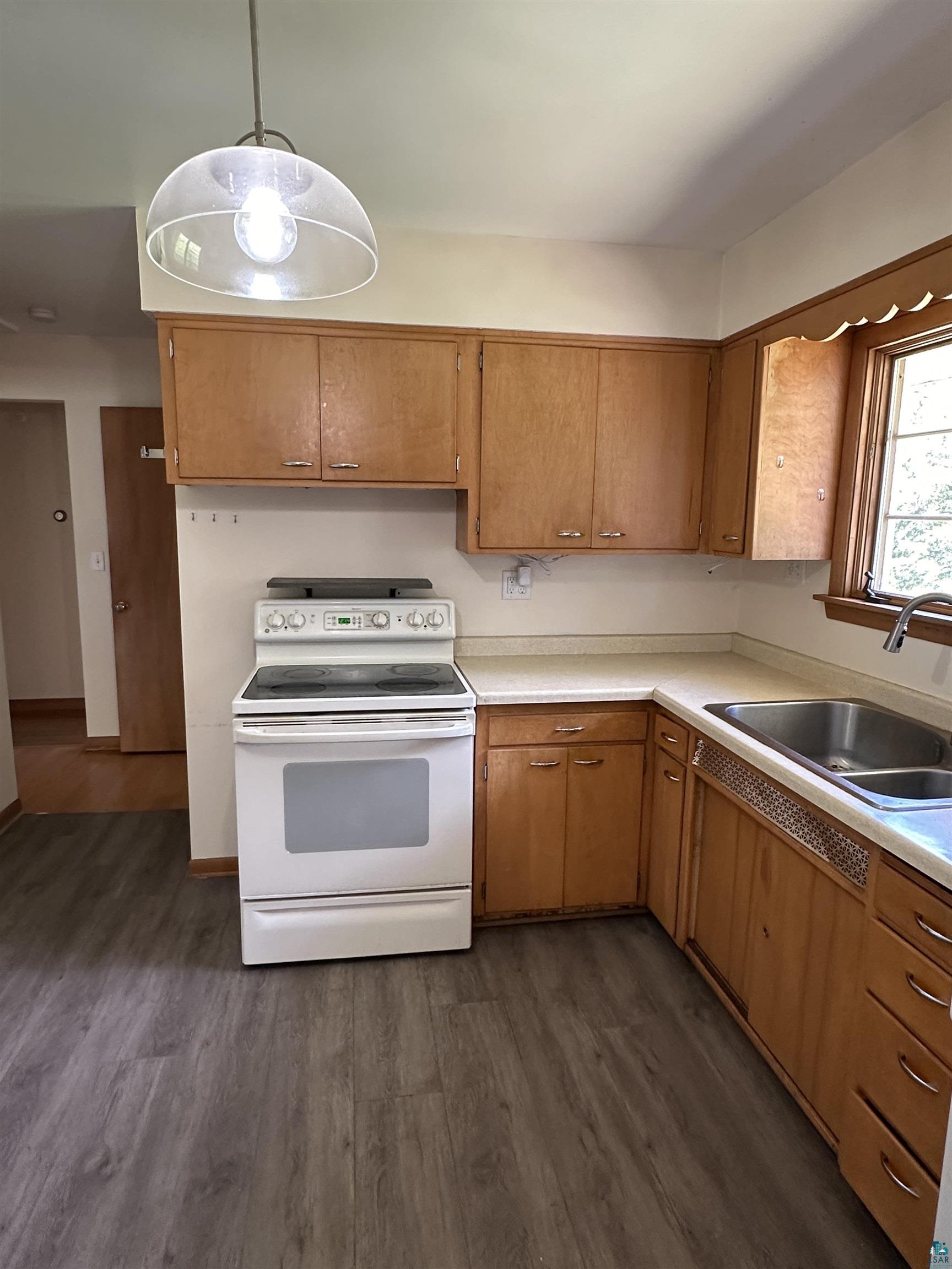 2309 Anderson Road Duluth, MN 55811 - Photo 12 of 36 Kitchen view showing the white electric stove.