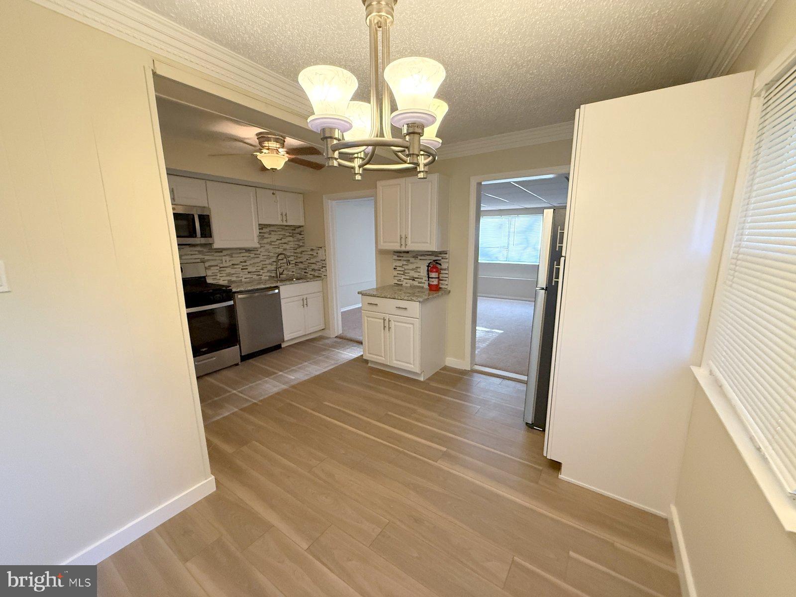 12 Wesley Avenue Cherry Hill, NJ 08002 - Photo 4 of 24 a view of a kitchen with a sink and dishwasher kitchen view