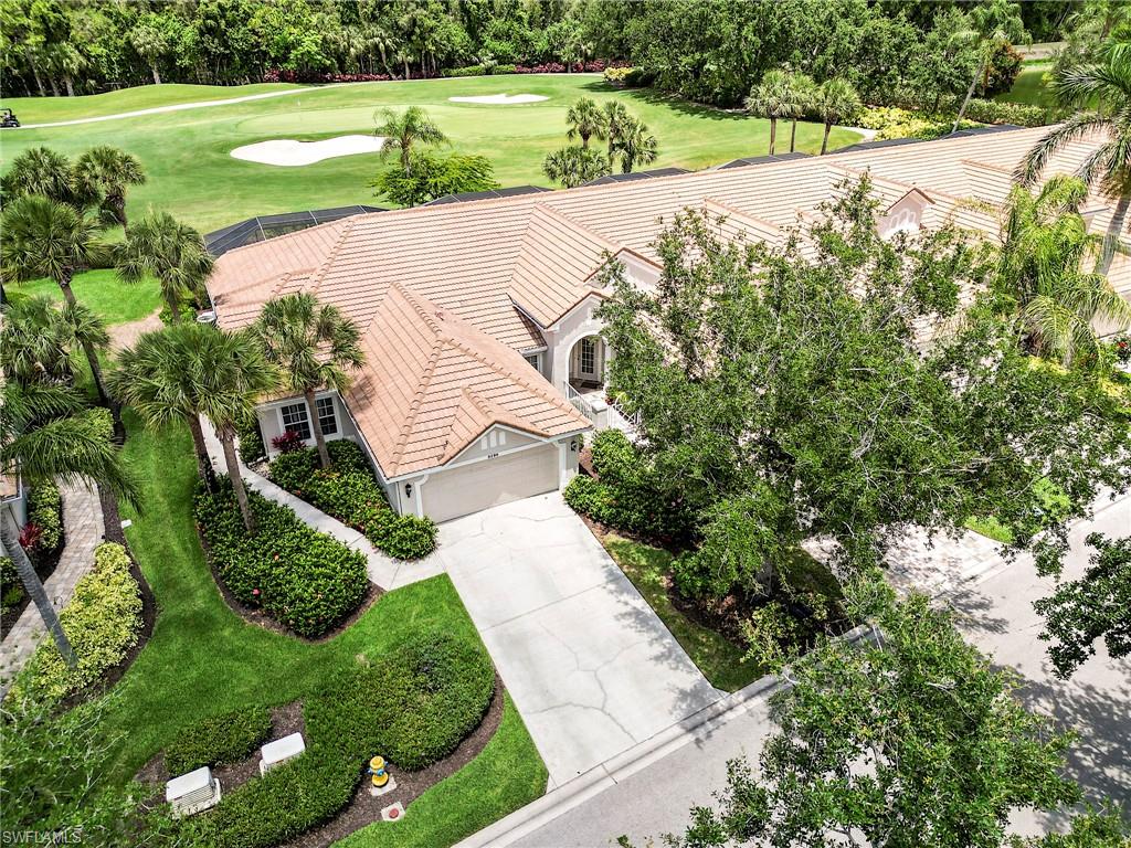 9296 Spring Run Boulevard Estero, FL 34135 - Photo 27 of 38 a view of a garden with a outdoor space