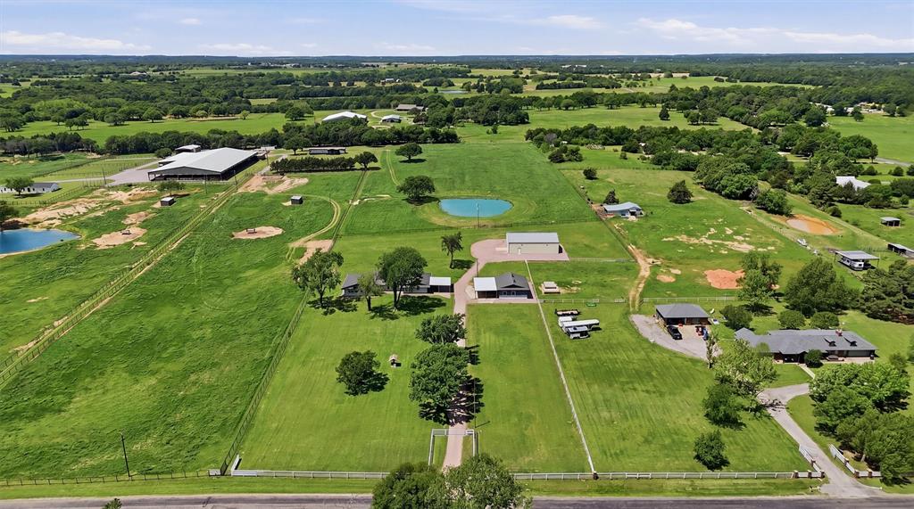 1861-1 Roland Road Whitesboro, TX 76273 - Photo 2 of 39 Aerial view from Roland Road - property includes pond and pasture behind it.