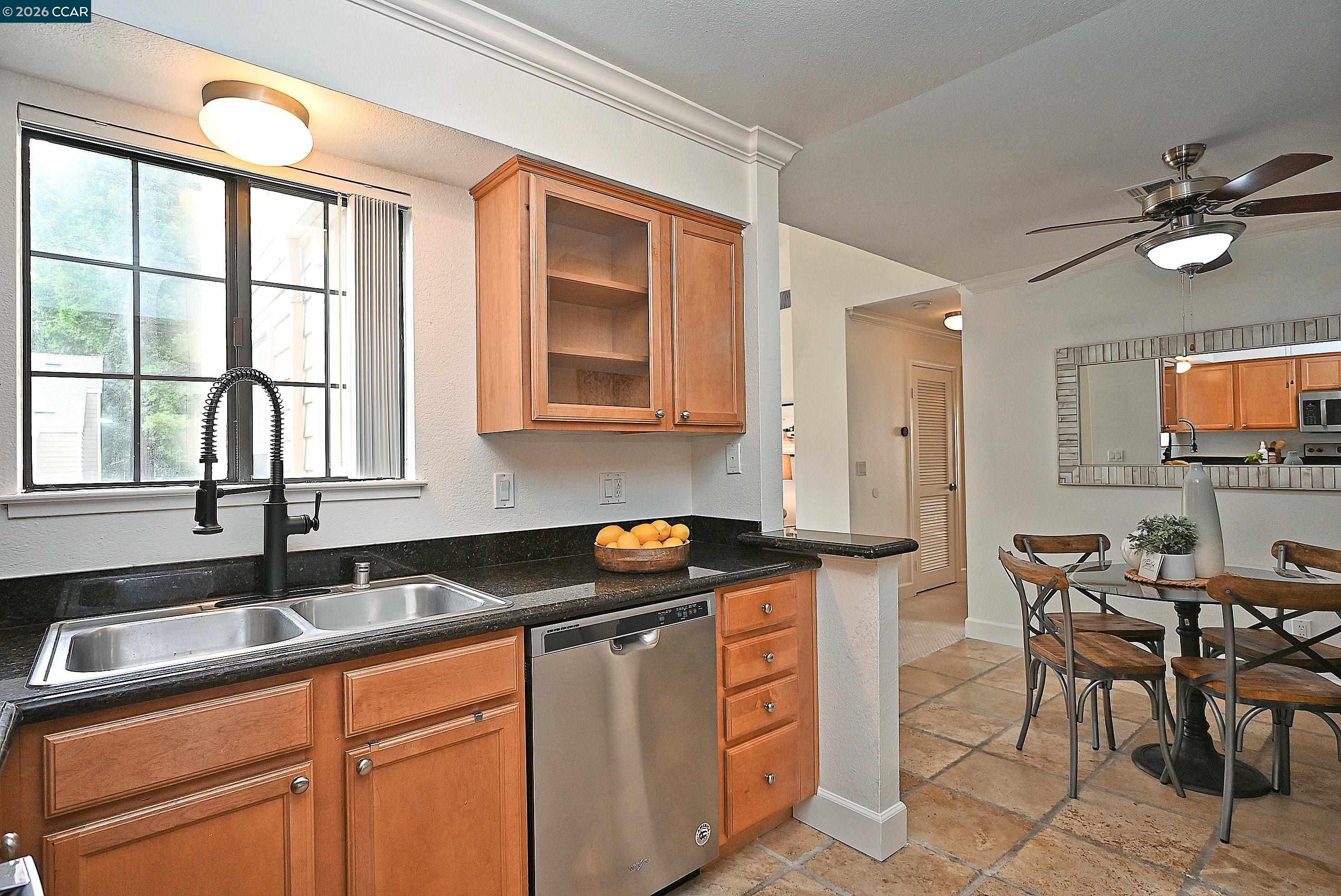 182 Eastridge Drive San Ramon, CA 94582 - Photo 14 of 47 a kitchen with stainless steel appliances granite countertop a sink stove and cabinets
