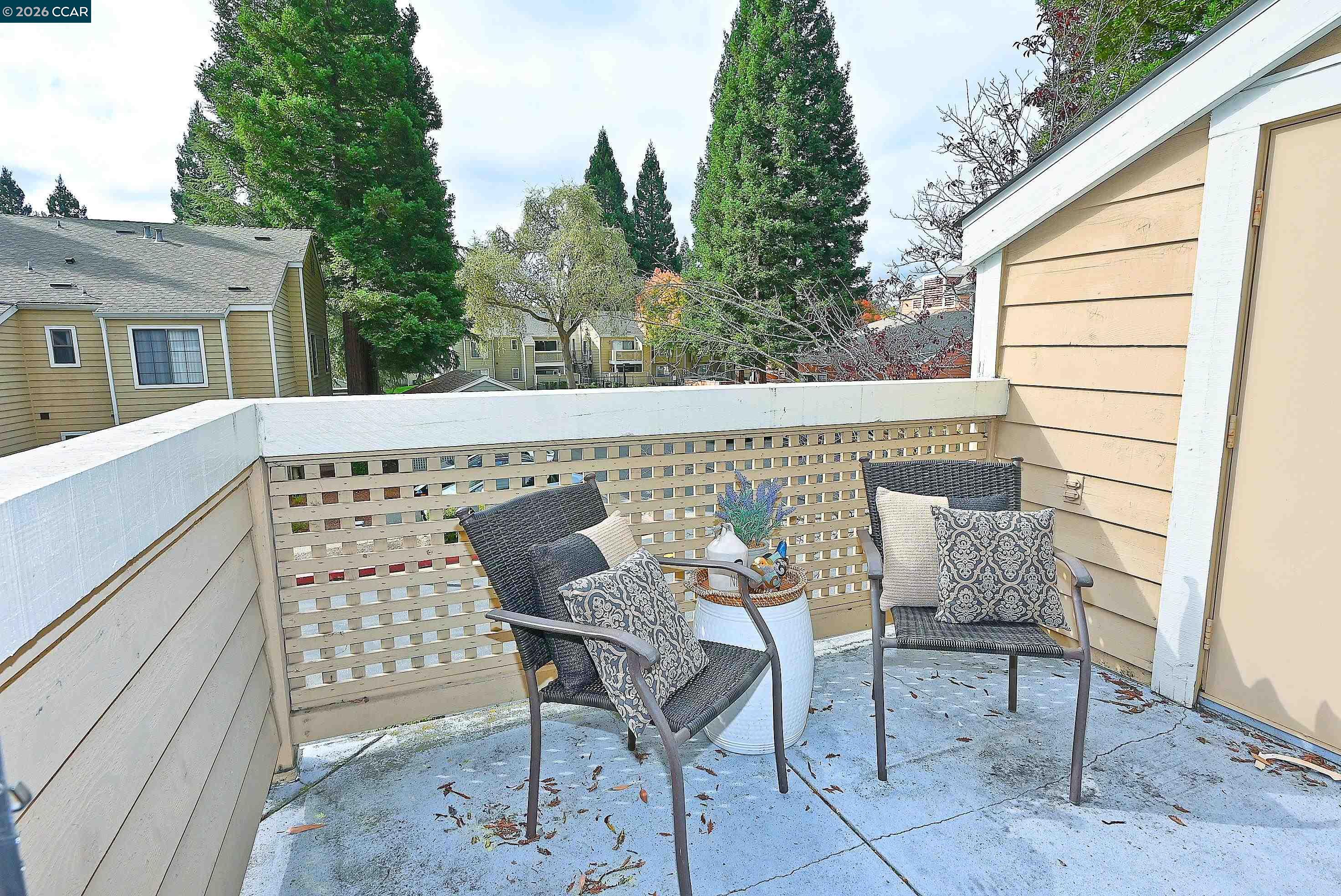 182 Eastridge Drive San Ramon, CA 94582 - Photo 29 of 47 a roof deck with table and chairs and potted plants