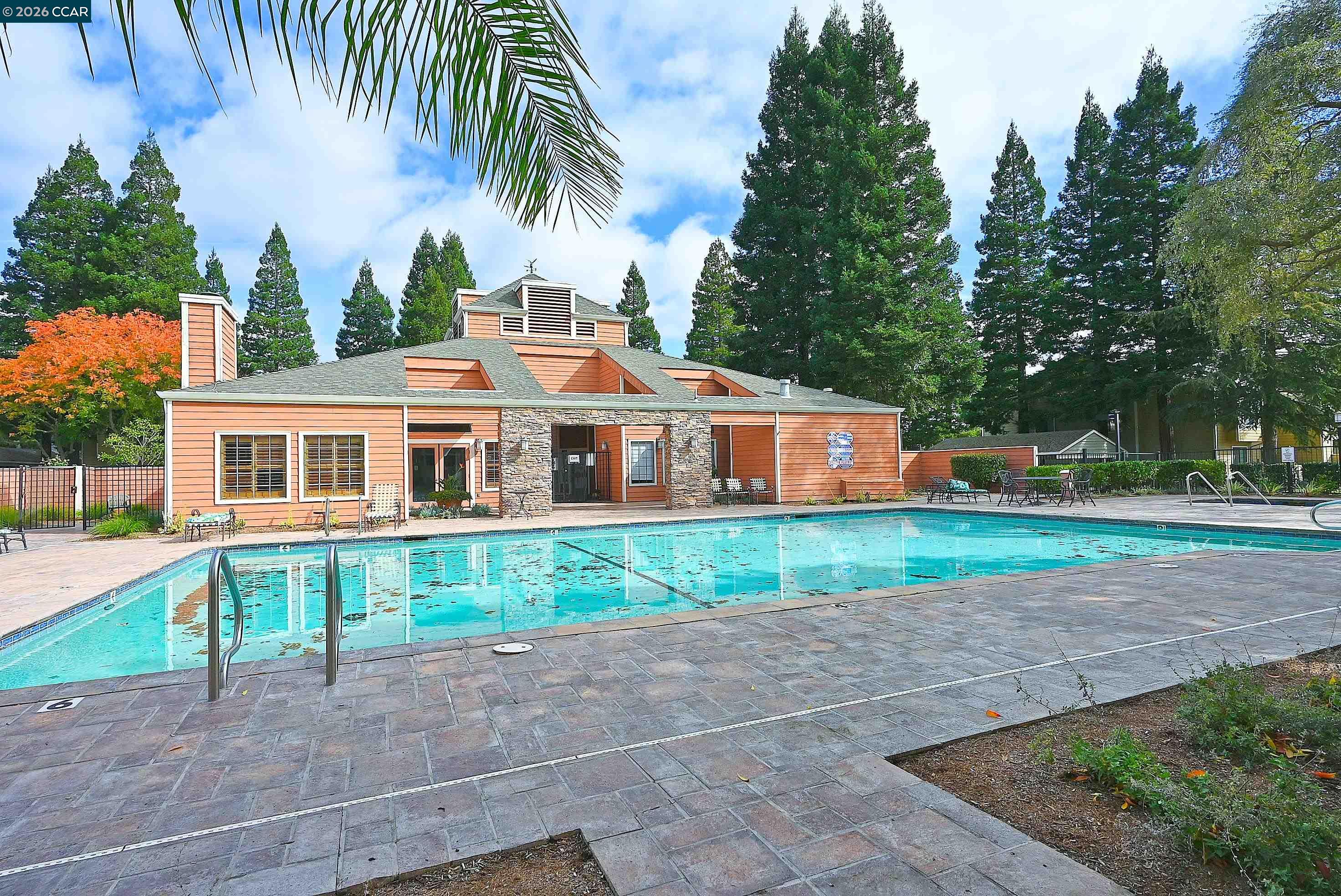 182 Eastridge Drive San Ramon, CA 94582 - Photo 37 of 47 a front view of a house with a yard and potted plants