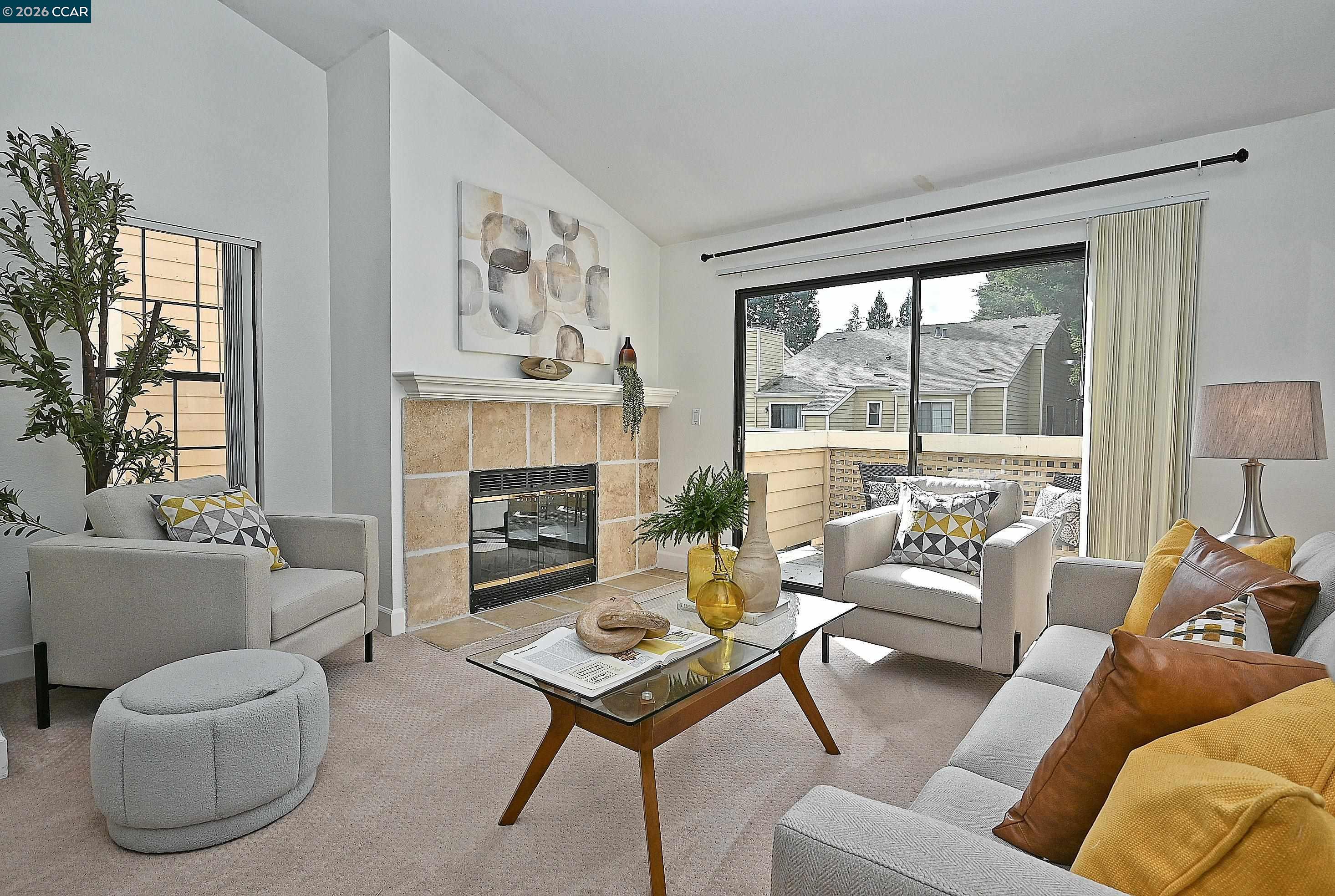 182 Eastridge Drive San Ramon, CA 94582 - Photo 4 of 47 a living room with furniture large window and a fireplace