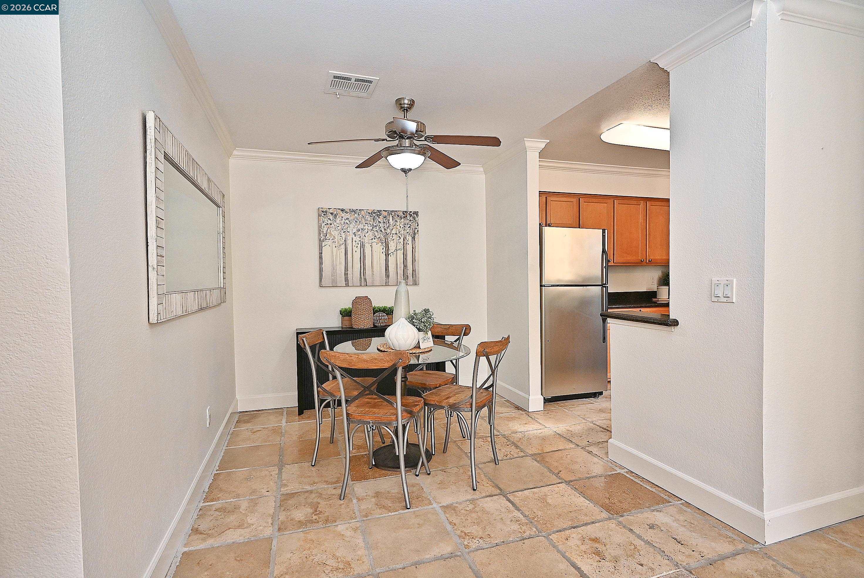 182 Eastridge Drive San Ramon, CA 94582 - Photo 10 of 47 a dining room with furniture and a chandelier