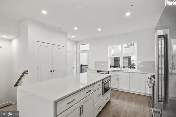 a bathroom with a sink and vanity