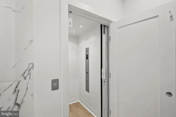 a view of a bathroom with a toilet and a sink