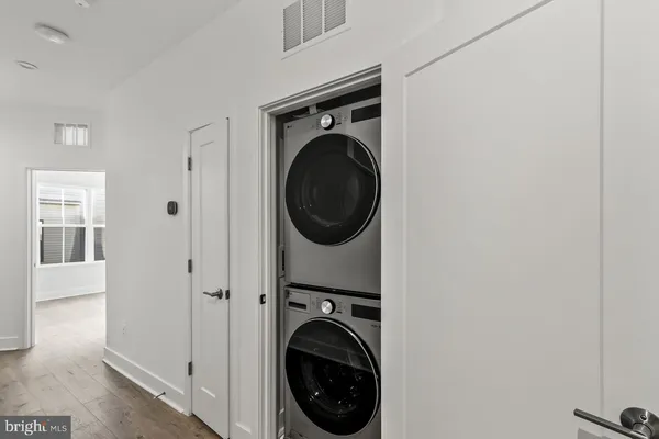 a view of an empty walk in closet