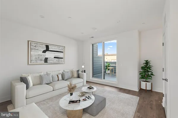 a view of a balcony with two chairs