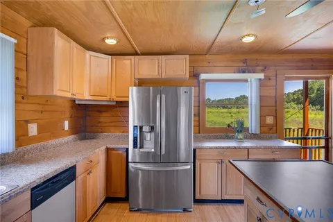 a hallway with wooden floor