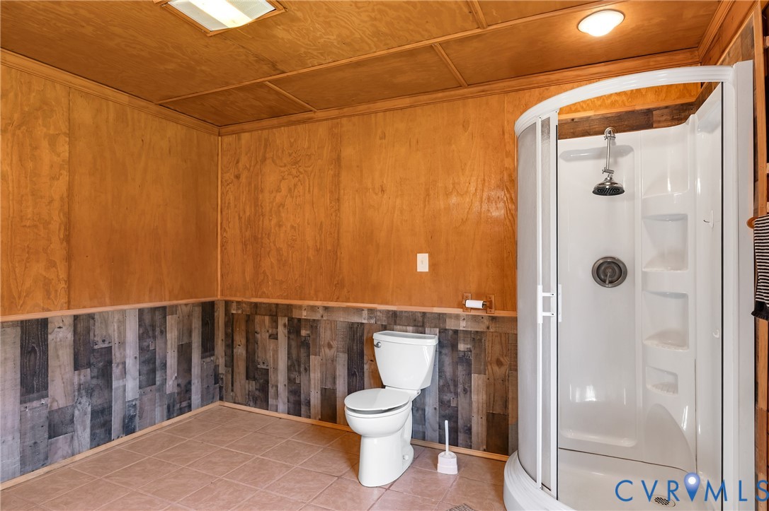 3000 Mineral Springs Road Boydton, VA 23917 - Photo 23 of 42 a bathroom with a toilet and a shower