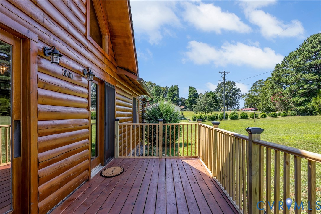 3000 Mineral Springs Road Boydton, VA 23917 - Photo 25 of 42 a view of balcony with wooden floor and fence and a yard