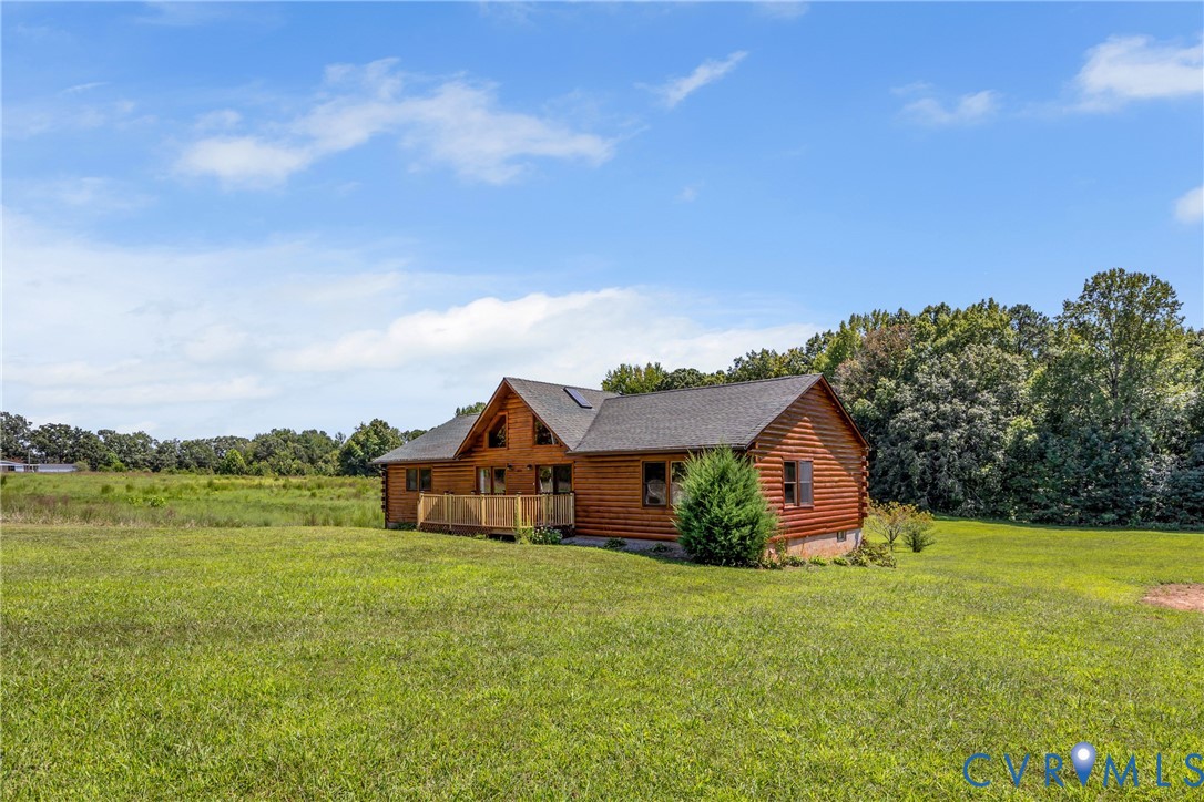 3000 Mineral Springs Road Boydton, VA 23917 - Photo 28 of 42 a front view of a house with garden