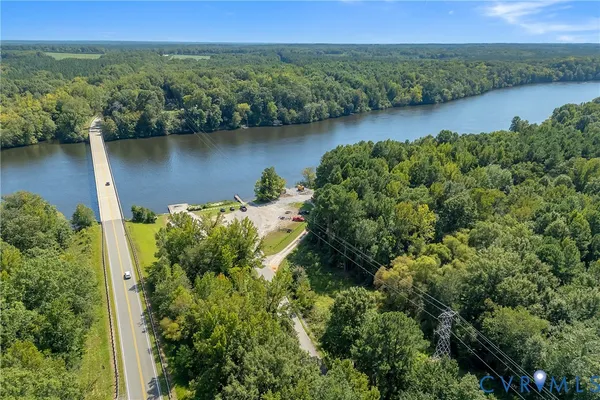 an aerial view of a houses with outdoor space and garden