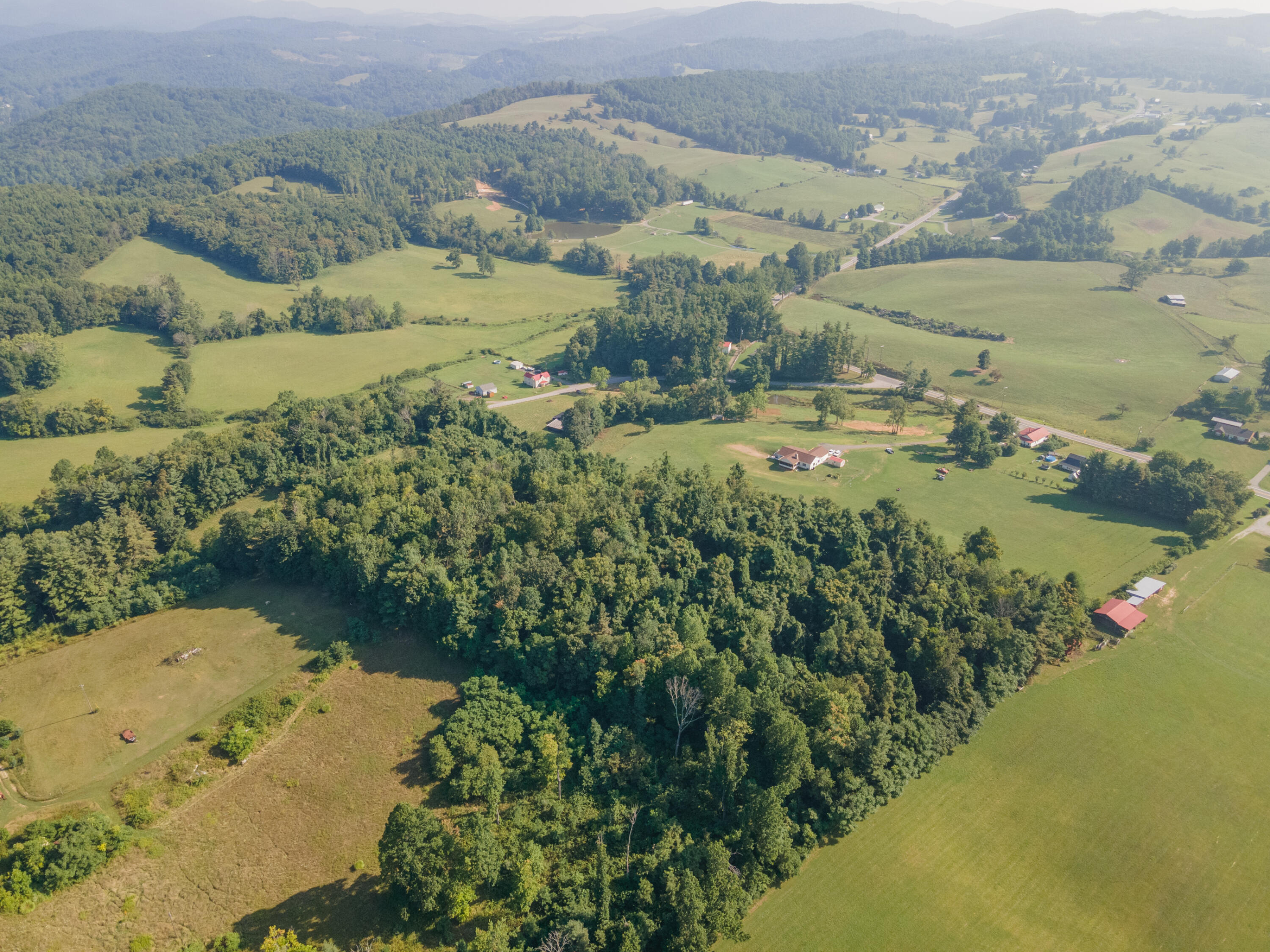 7950 Conner Road Northeast Copper Hill, VA 24079 - Photo 19 of 39 an aerial view of ocean with residential houses with outdoor space