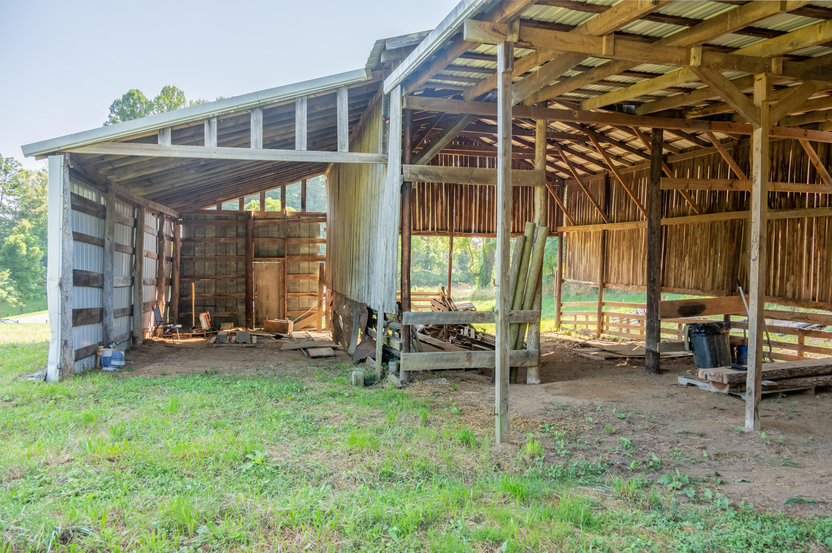 7950 Conner Road Northeast Copper Hill, VA 24079 - Photo 34 of 39 a view of a house with backyard porch and sitting area