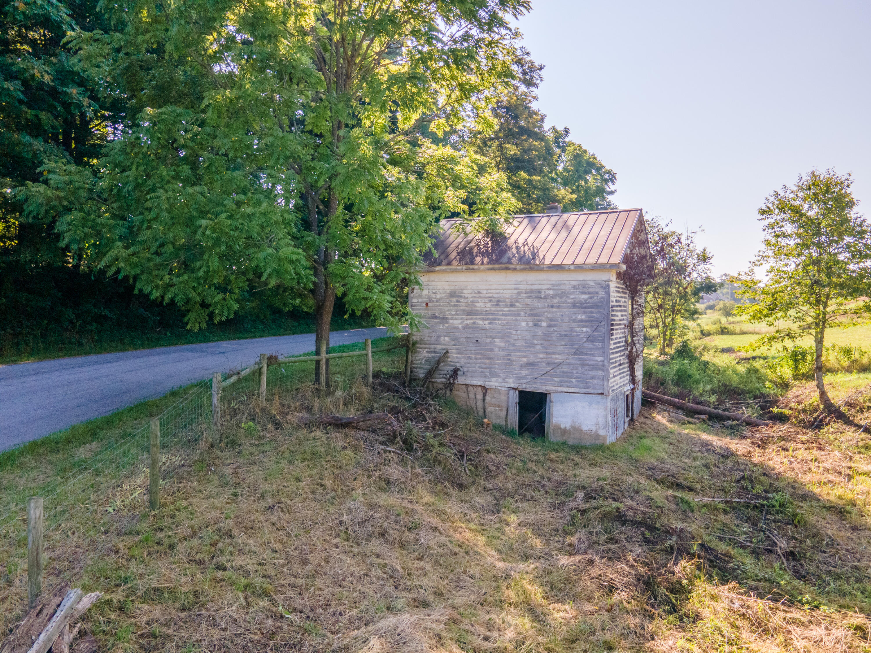 7950 Conner Road Northeast Copper Hill, VA 24079 - Photo 35 of 39 a view of a house with a yard and tree