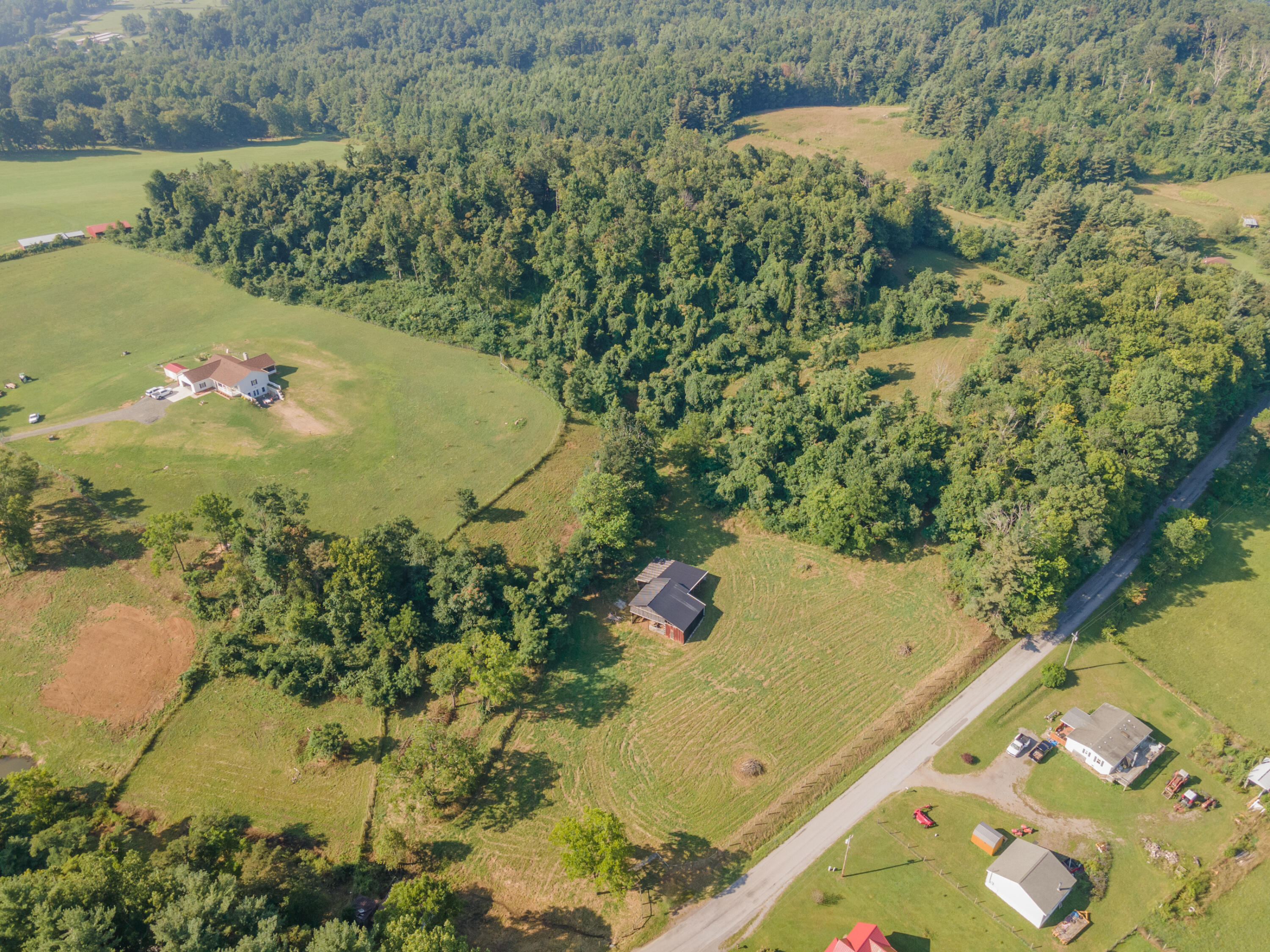 7950 Conner Road Northeast Copper Hill, VA 24079 - Photo 4 of 39 a view of a lake with a yard