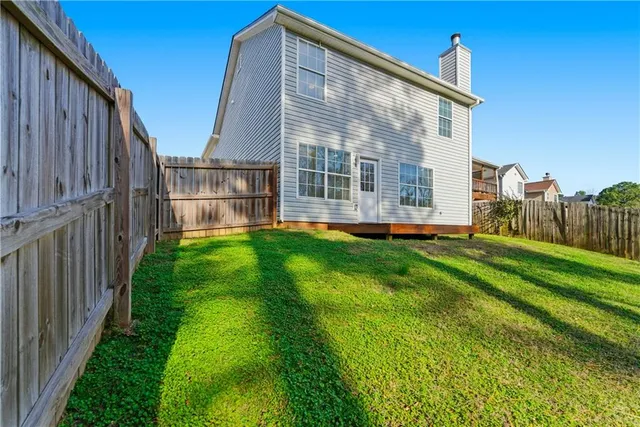 a view of a yard with an trees