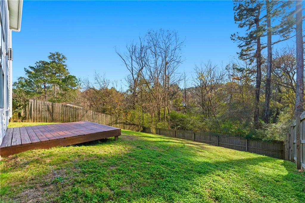 1500 Keystone Drive Conley, GA 30288 - Photo 25 of 25 a view of a yard with an trees
