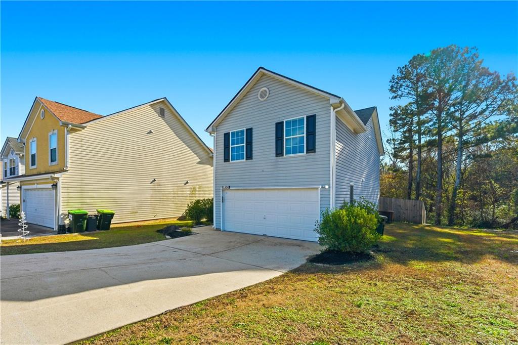 1500 Keystone Drive Conley, GA 30288 - Photo 3 of 25 a view of a house with a yard