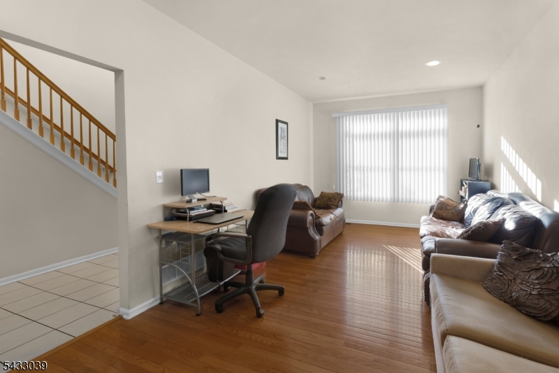 158 Autumn Ridge Road Morris Plains, NJ 07950 - Photo 14 of 26 a living room with furniture and a window