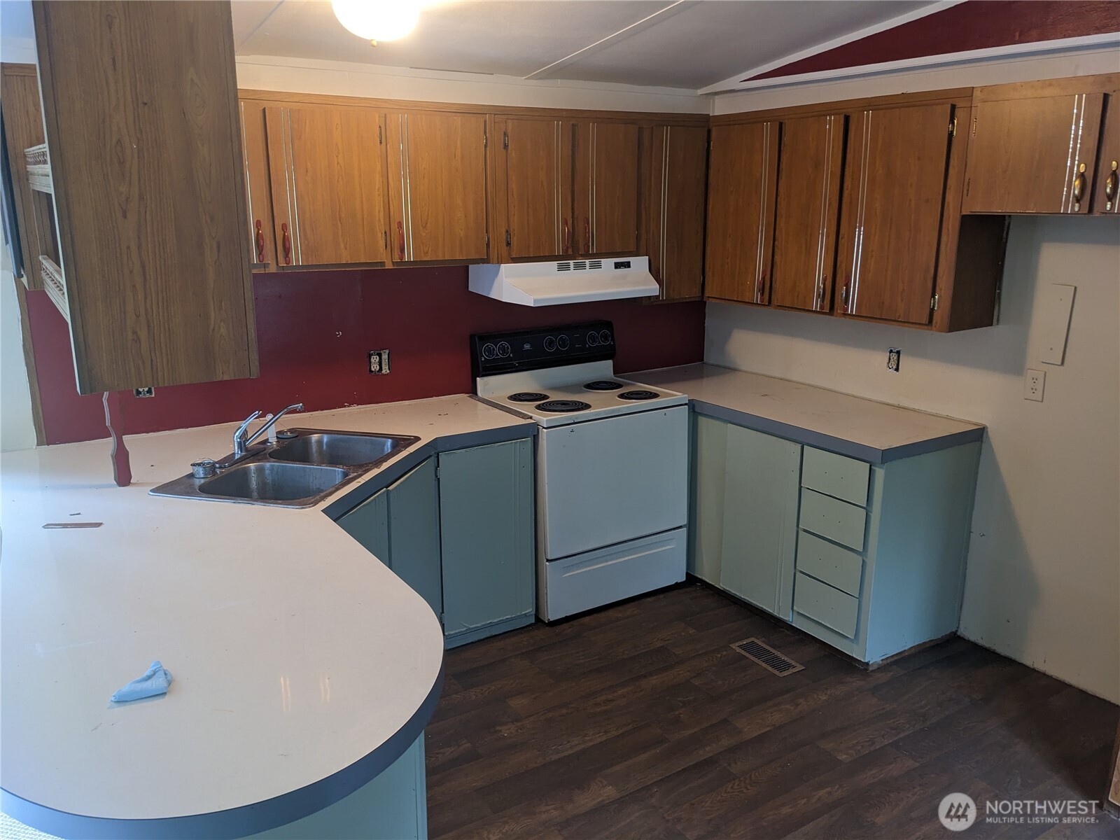 46400 Baker Loop Road Concrete, WA 98237 - Photo 6 of 12 a kitchen with a sink cabinets and window