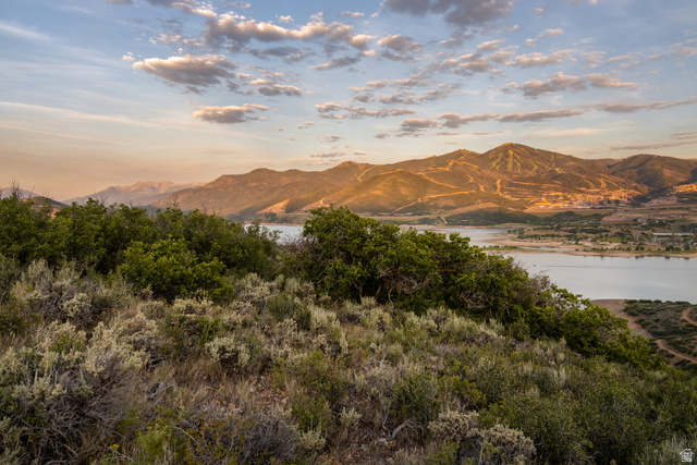 9269 North Sunset Road Kamas, UT 84036 - Photo 9 of 21 Expansive landscape with a prominent body of water, rolling hills, and distant mountains