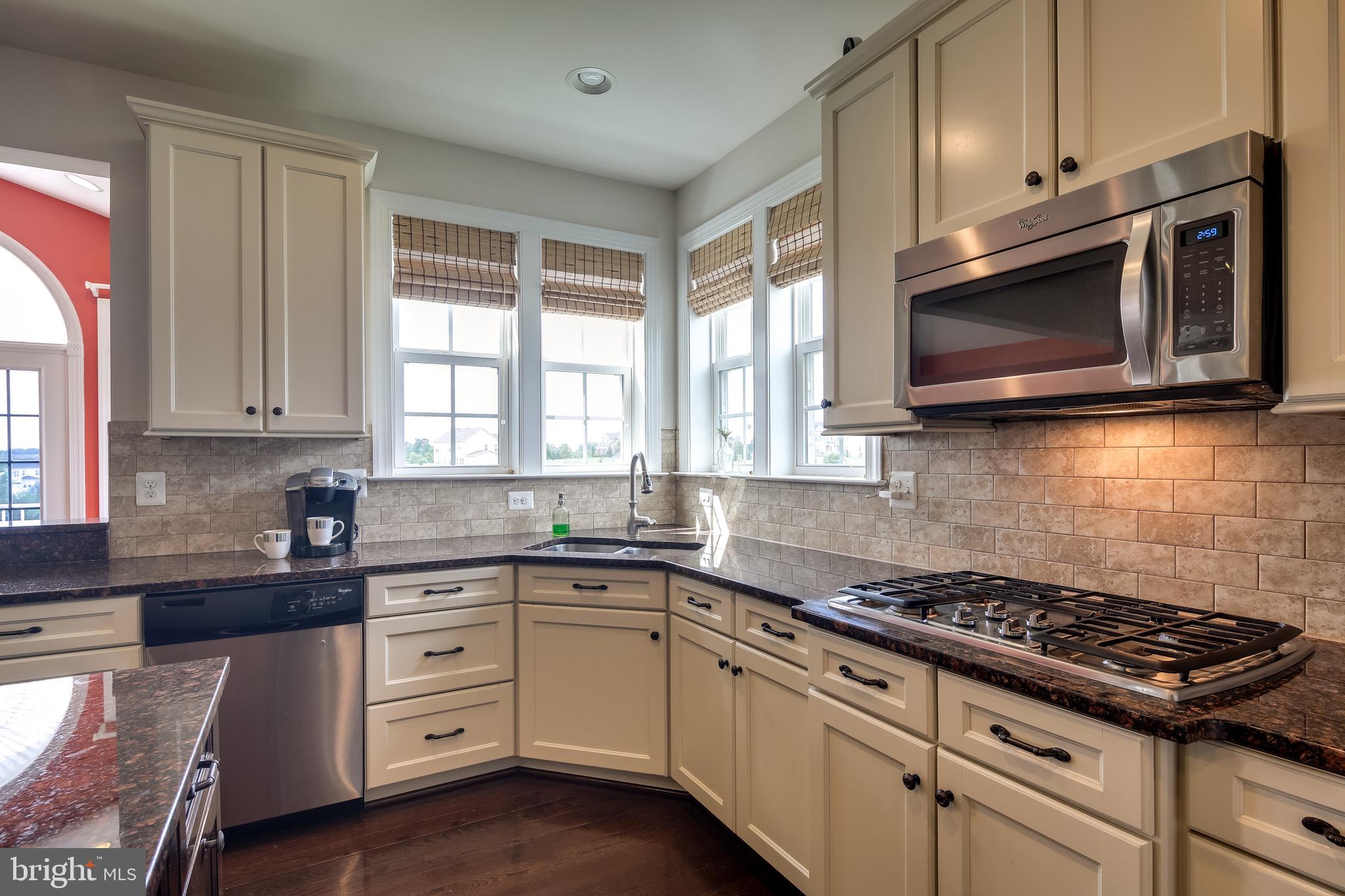 1275 Cambria Road Westminster, MD 21157 - Photo 11 of 50 Kitchen with custom backsplash