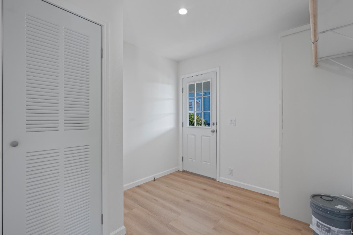 144 Holm Road, Unit 120 Watsonville, CA 95076 - Photo 18 of 25 a view of empty room with wooden floor