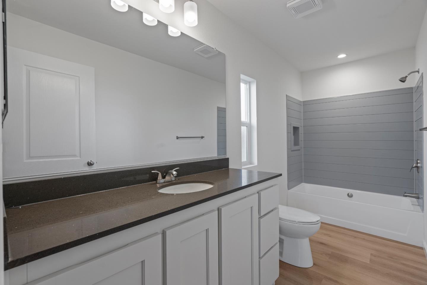 144 Holm Road, Unit 120 Watsonville, CA 95076 - Photo 25 of 25 a bathroom with a sink a toilet and shower