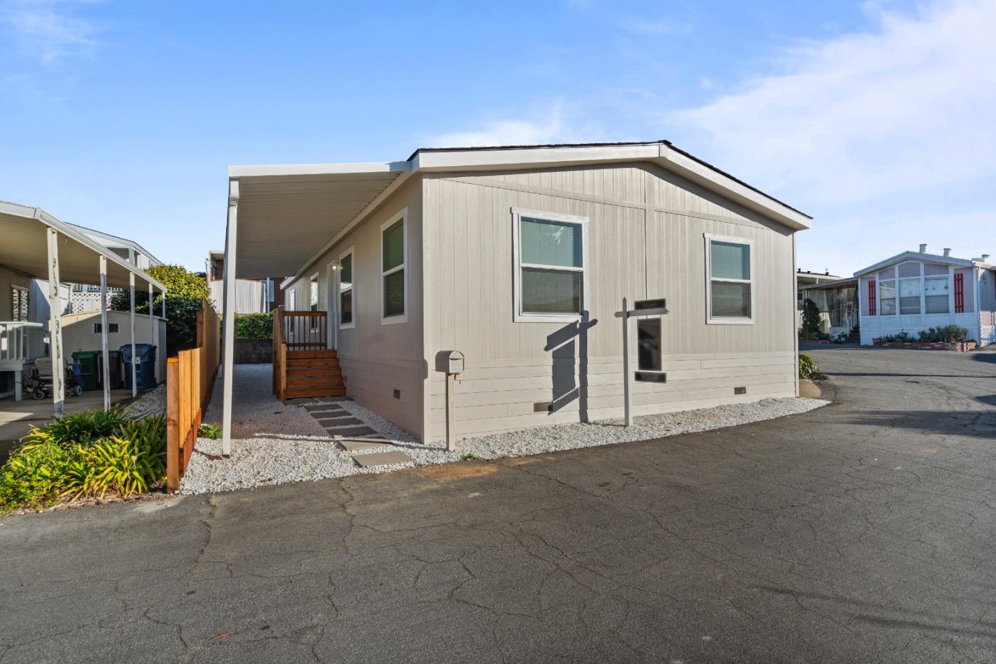 144 Holm Road, Unit 120 Watsonville, CA 95076 - Photo 3 of 25 a view of a house with a street