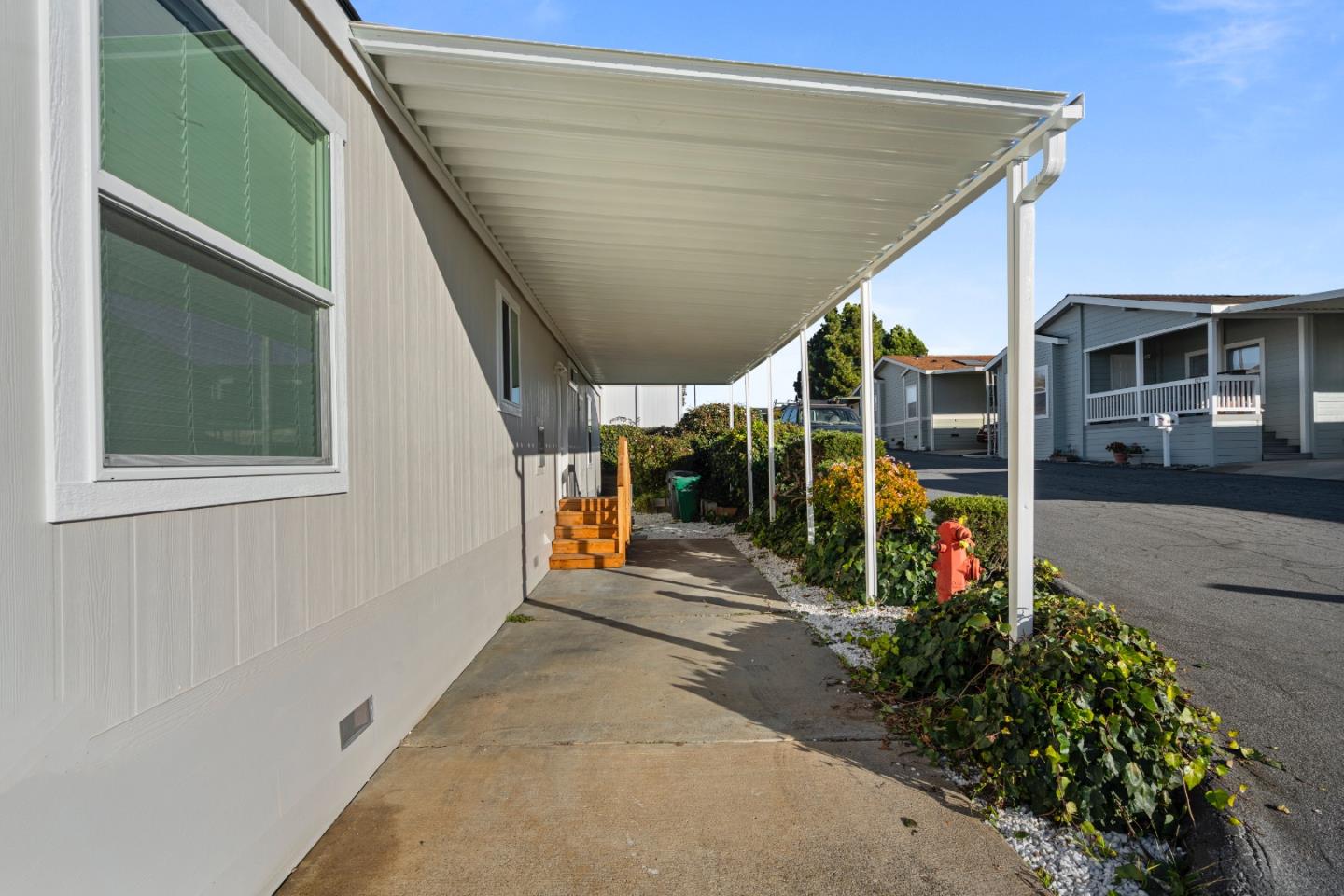 144 Holm Road, Unit 120 Watsonville, CA 95076 - Photo 4 of 25 a view of a garage with street