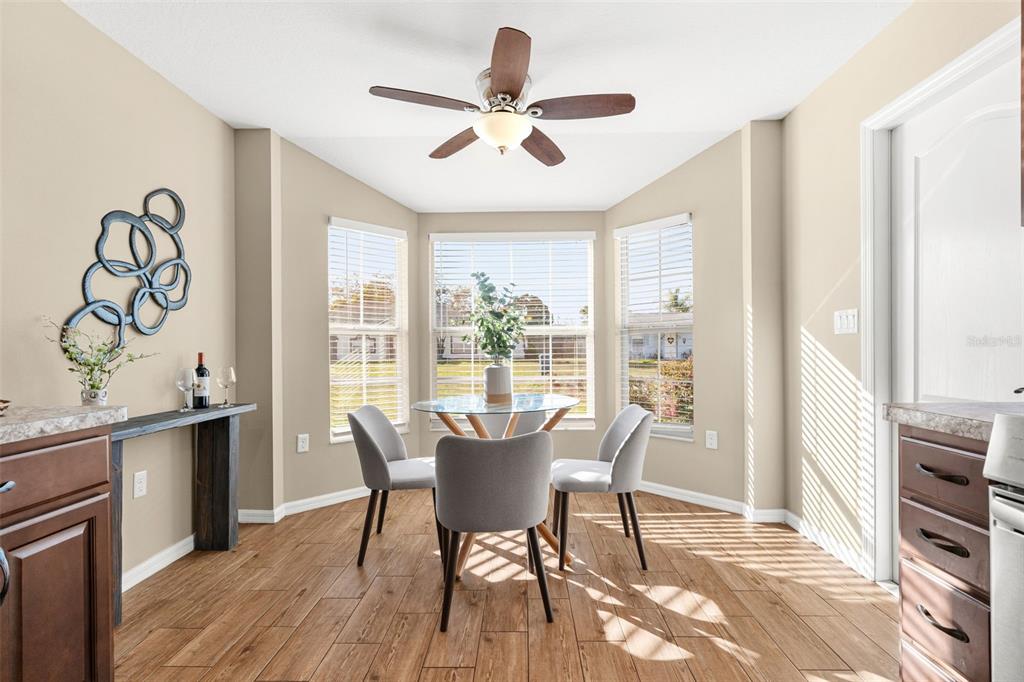 5346 Pierpoint Avenue Spring Hill, FL 34608 - Photo 13 of 41 a view of a dining room with furniture window and outside view