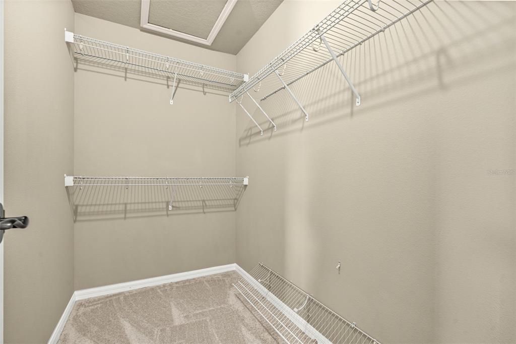 5346 Pierpoint Avenue Spring Hill, FL 34608 - Photo 20 of 41 a view of a room with racks on the wall