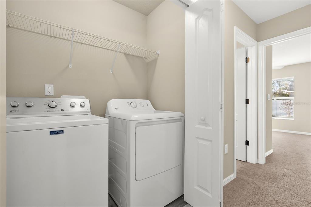 5346 Pierpoint Avenue Spring Hill, FL 34608 - Photo 28 of 41 a utility room with dryer and washer