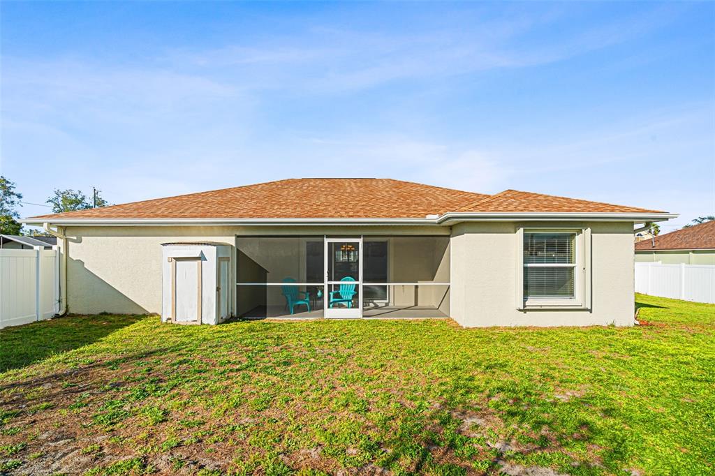 5346 Pierpoint Avenue Spring Hill, FL 34608 - Photo 32 of 41 a front view of house with yard