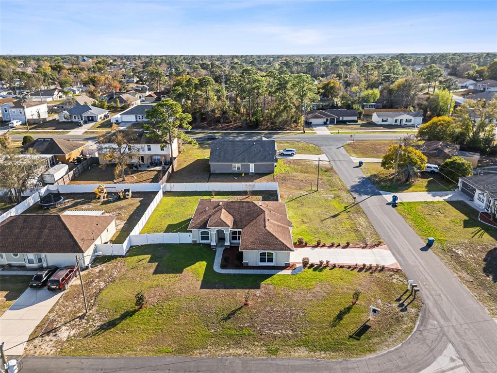 5346 Pierpoint Avenue Spring Hill, FL 34608 - Photo 34 of 41 an aerial view of residential houses with outdoor space