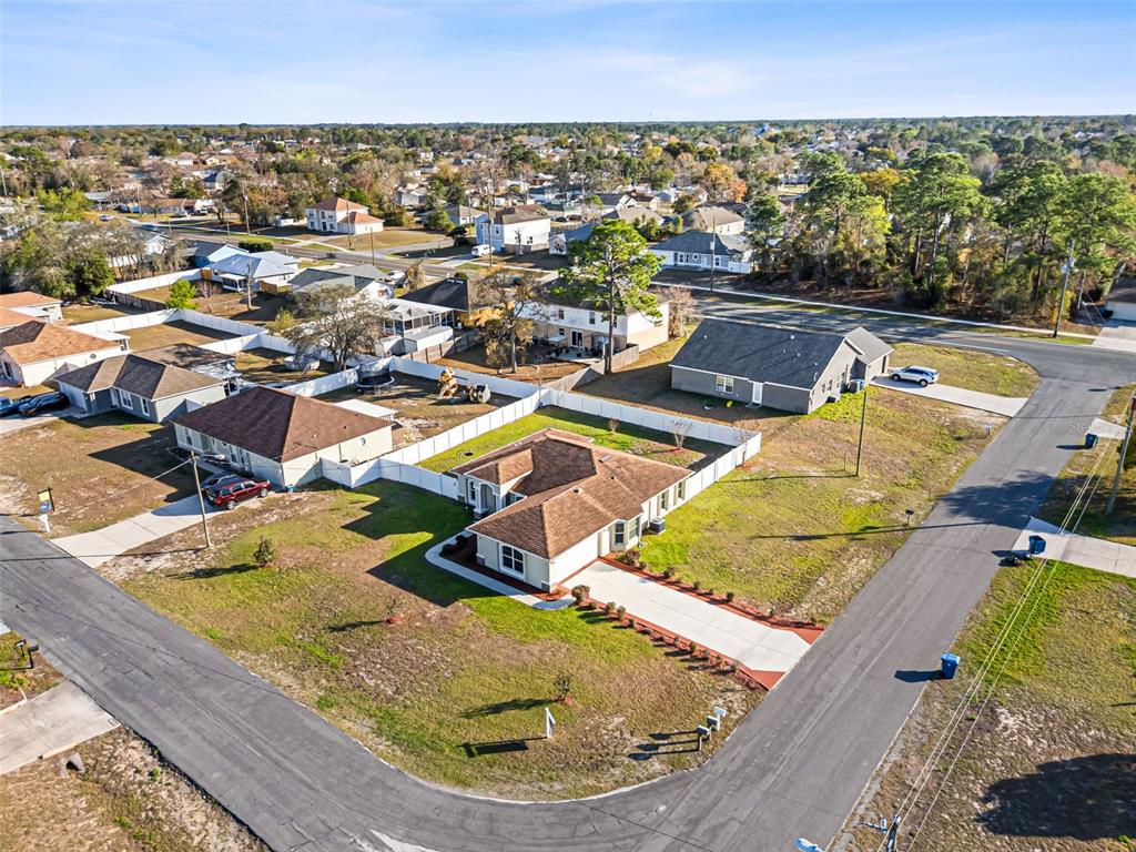 5346 Pierpoint Avenue Spring Hill, FL 34608 - Photo 35 of 41 an aerial view of a house with swimming pool and ocean view