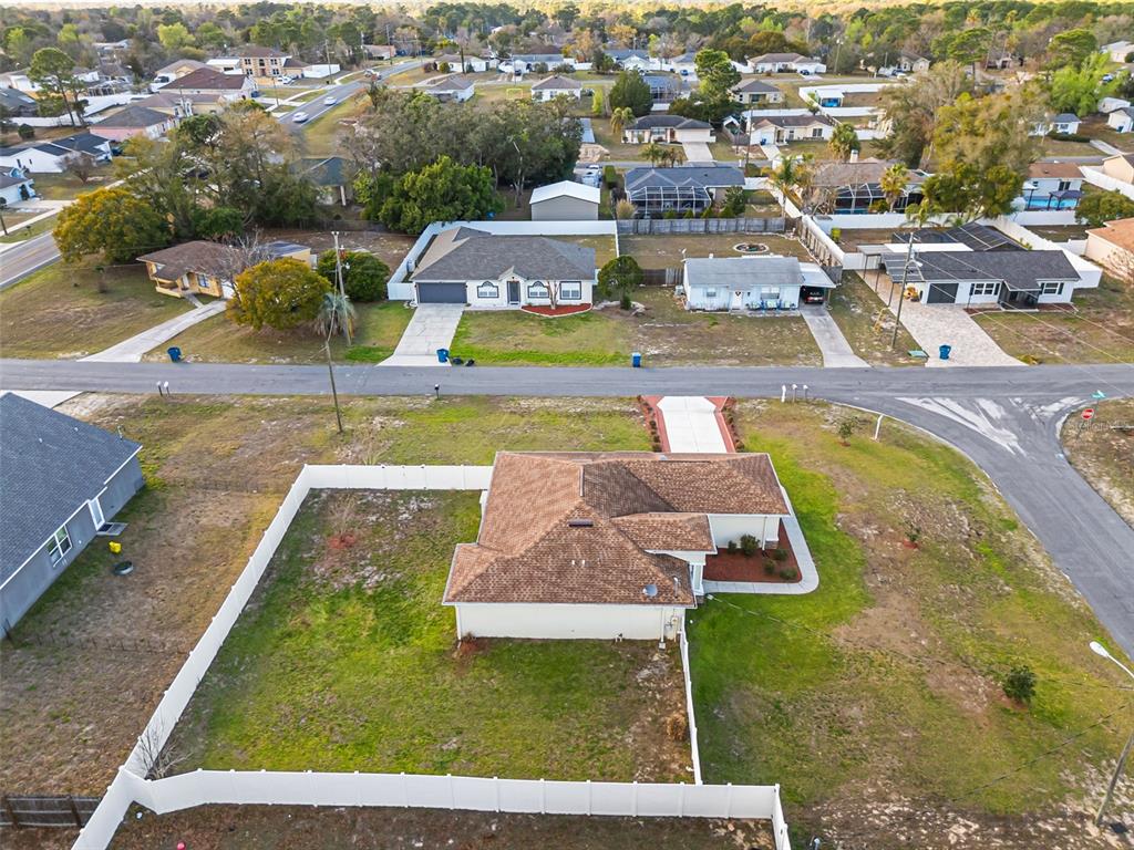 5346 Pierpoint Avenue Spring Hill, FL 34608 - Photo 39 of 41 a view of a swimming pool with lounge chairs
