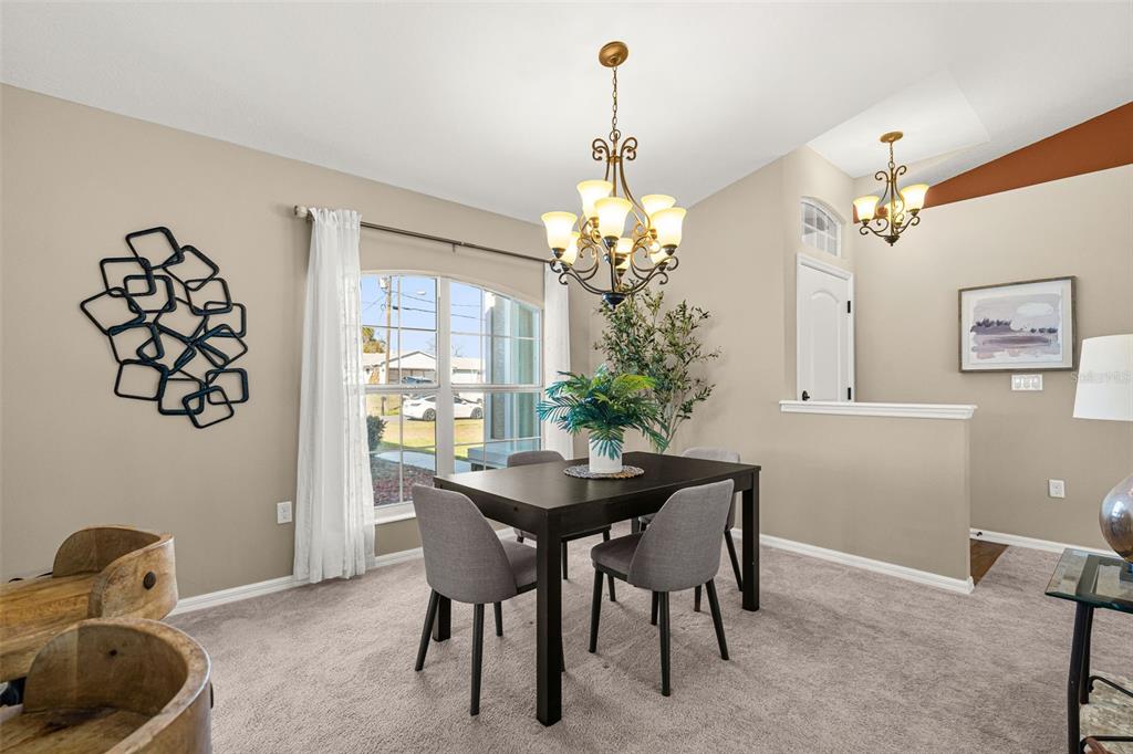 5346 Pierpoint Avenue Spring Hill, FL 34608 - Photo 10 of 41 a dining room with furniture and window