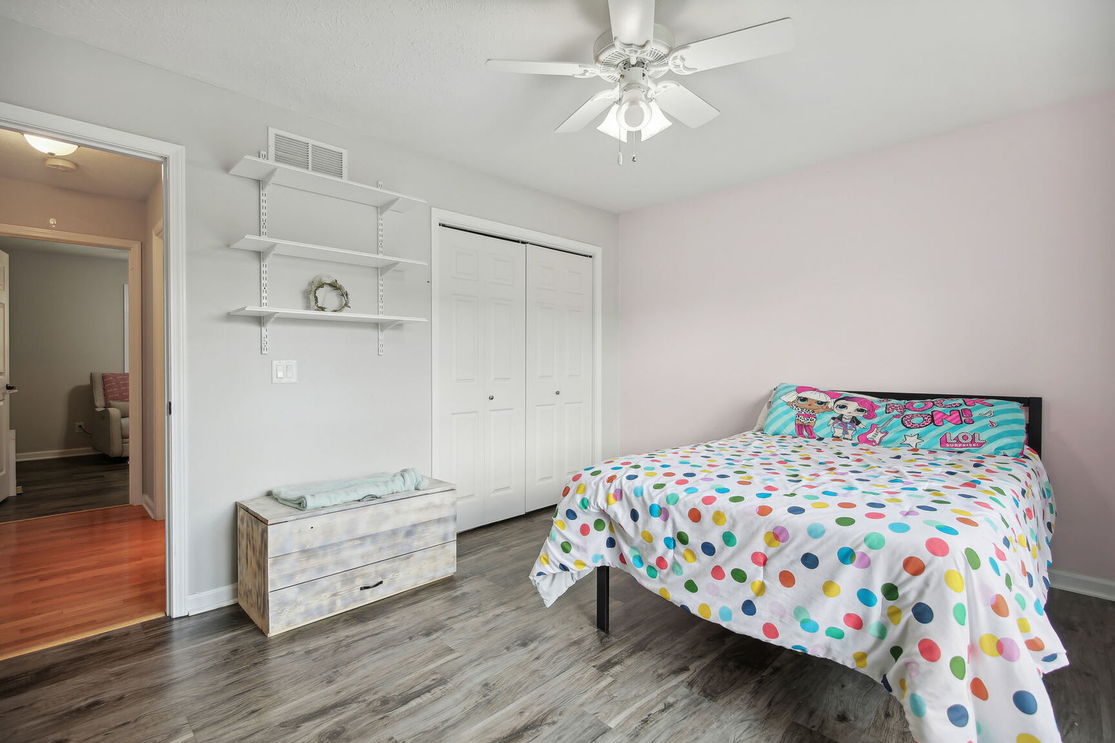 809 Lavender Drive Savoy, IL 61874 - Photo 11 of 27 a bedroom with a bed and wooden floor