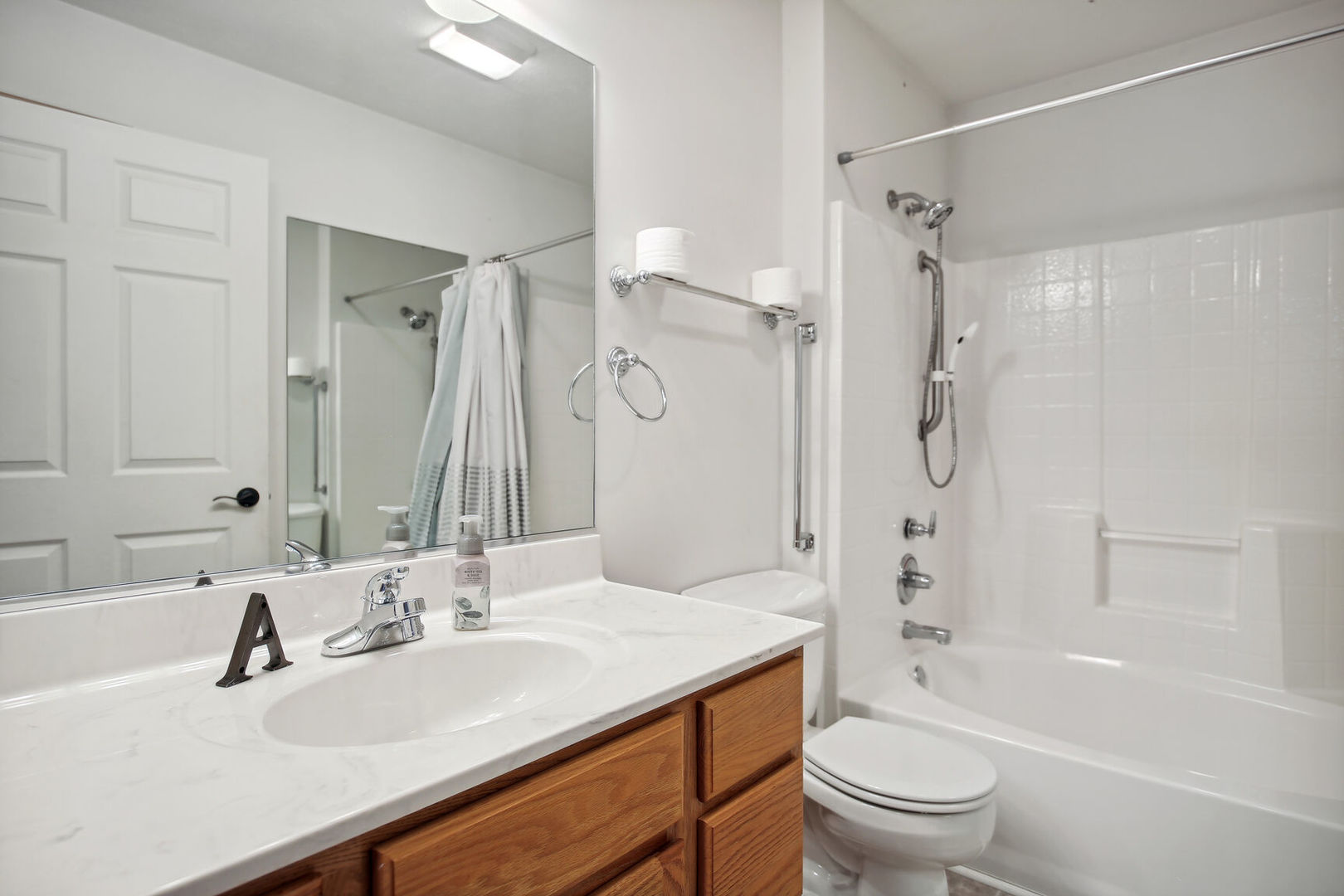 809 Lavender Drive Savoy, IL 61874 - Photo 17 of 27 a bathroom with a sink toilet tub and shower