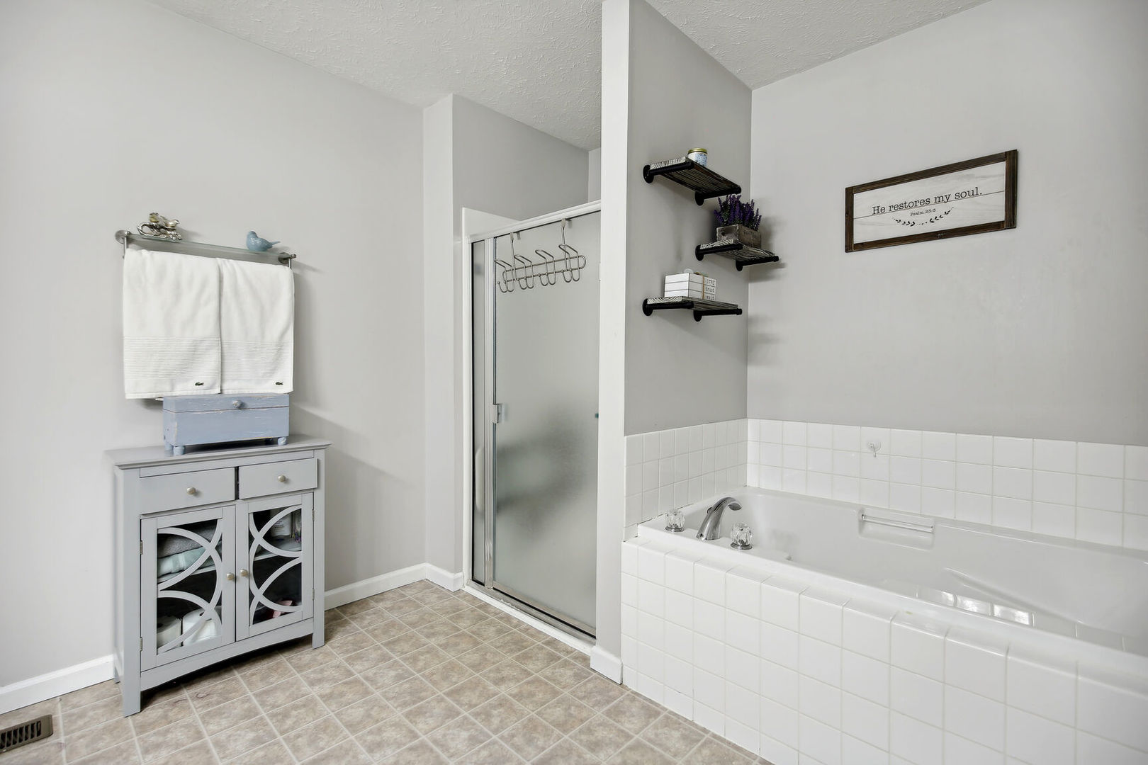 809 Lavender Drive Savoy, IL 61874 - Photo 21 of 27 a bathroom with a bathtub and a shower