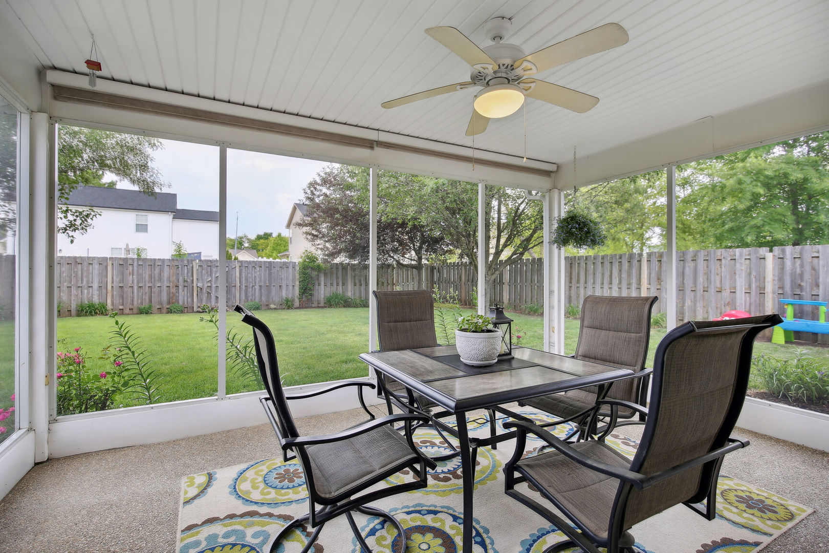 809 Lavender Drive Savoy, IL 61874 - Photo 22 of 27 a view of a patio with a table chairs and a backyard