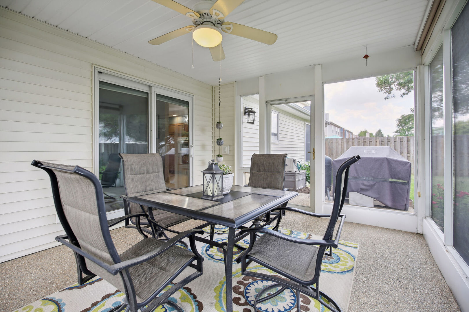 809 Lavender Drive Savoy, IL 61874 - Photo 23 of 27 a view of a dining room with furniture and a large window