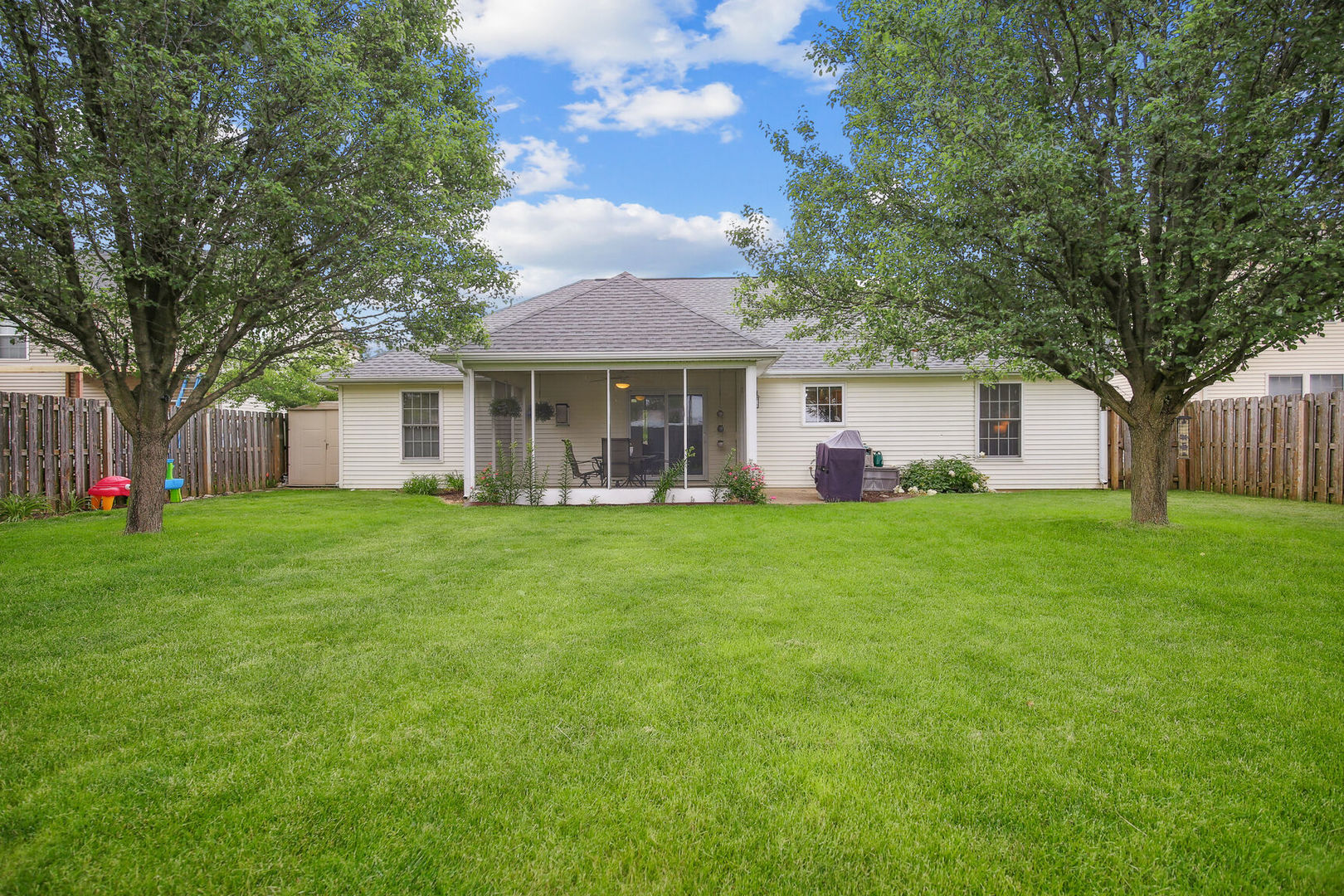 809 Lavender Drive Savoy, IL 61874 - Photo 24 of 27 a front view of house with yard and green space