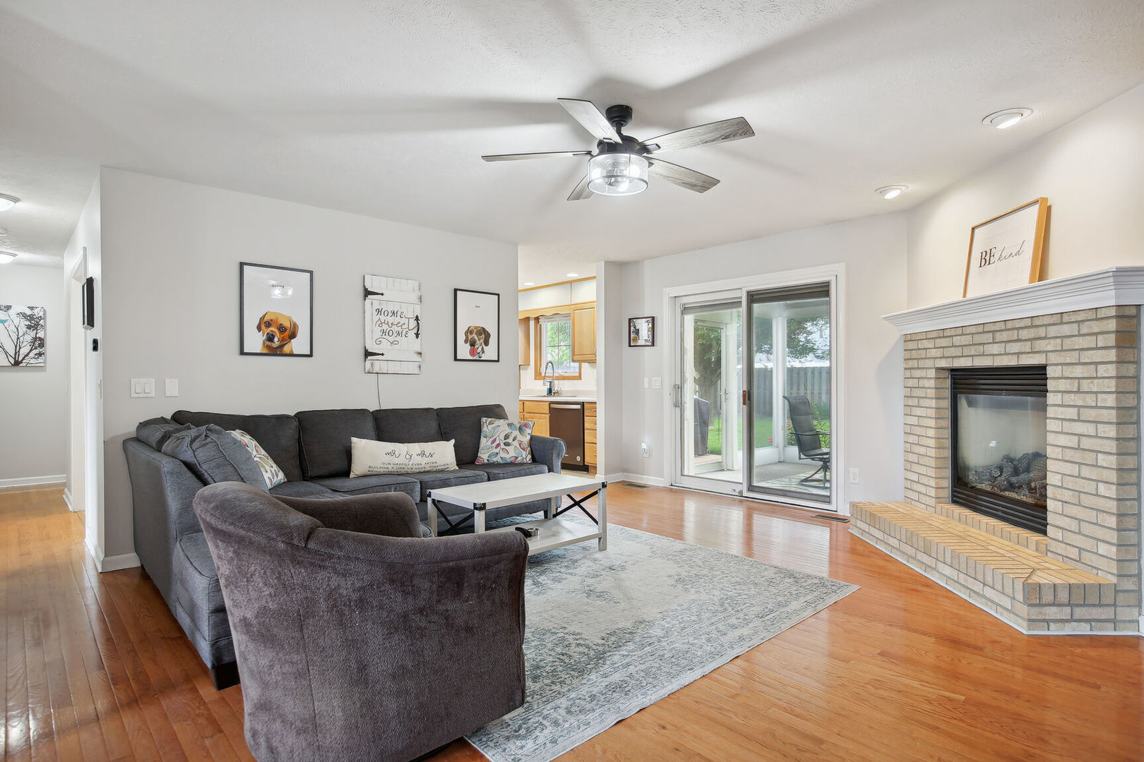 809 Lavender Drive Savoy, IL 61874 - Photo 3 of 27 a living room with furniture and a fireplace
