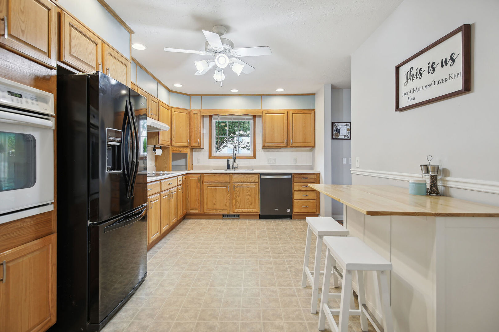 809 Lavender Drive Savoy, IL 61874 - Photo 8 of 27 a kitchen with cabinets and stainless steel appliances