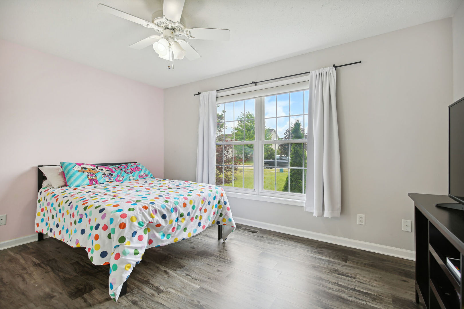 809 Lavender Drive Savoy, IL 61874 - Photo 10 of 27 a bedroom with a bed and a large window